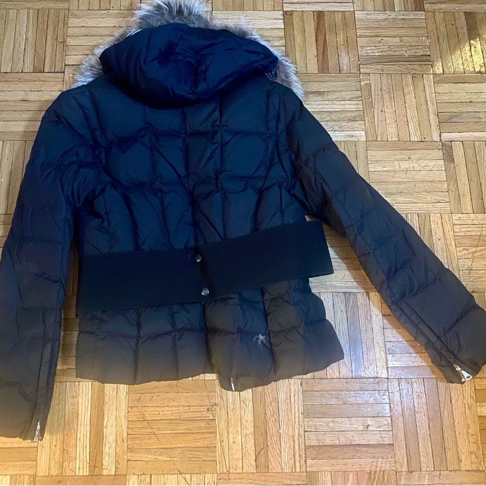 High fashion Hooded real fox fur. With elastic puffer goose coat.